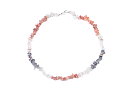 Multi-colored tumbled moonstone chips necklace with clasp, isolated on white backgroundの写真素材