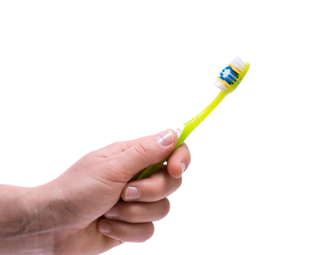 Colorful plastic toothbrush isolated on white backgroundの写真素材