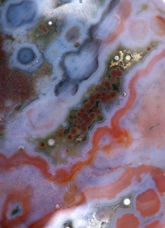 Polished multicolor ocean jasper from Madagascar background, texture