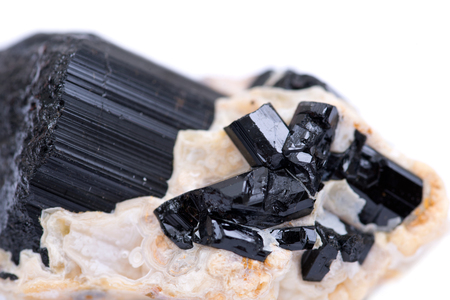 Black Tourmaline Point & Babies Nestled in Feldspar From Brazil, isolated on white backgroundの写真素材