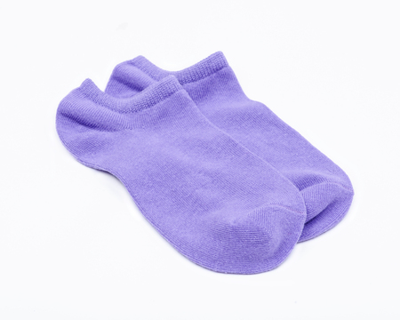 Woman's original ankle low rise violet socks isolated on white backgroundの写真素材