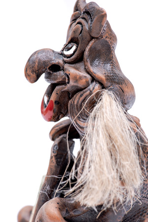 Old smiling witch with red lips isolated on white backgroundの写真素材