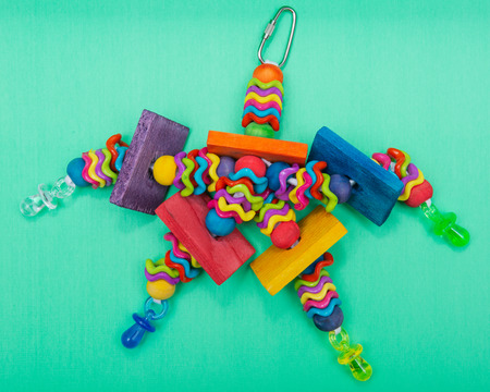 Wiggles and Wafers Bird Toy for all kind of birds, including Parrots. Prevents Bird Boredom.の写真素材