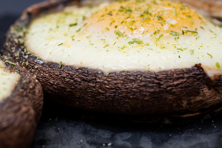 Brunch Style Portobello Mushroom Baked Eggs. Stuffed Mushrooms.の写真素材