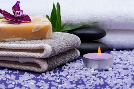 Spa Wellness Concept. Natural Back Scrubber,Goat's milk Soap, Basalt Stones, Orchid Flower, Bamboo...