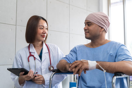 Asian man cancer patient smiling and happy with health checkup result after listening to oncologist...