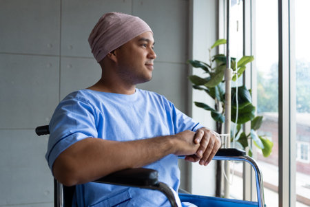 Asian man cancer patient smiling and happy with health checkup result after listening to oncologist...