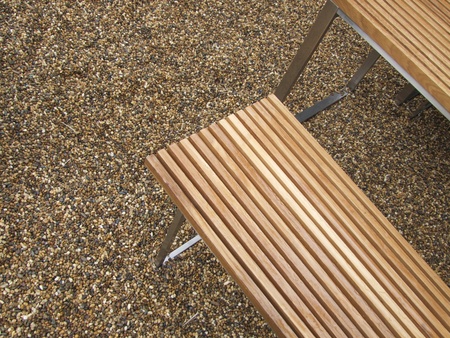 wooden chair on the pebble floor