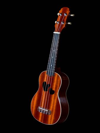 hawaii ukulele guitar isolated against black background, heart sound holeの写真素材