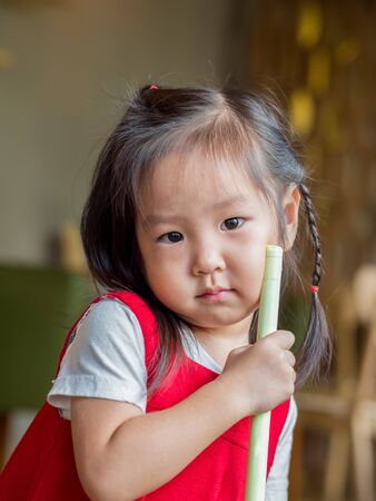 Portrait of an asian cute little girlの写真素材