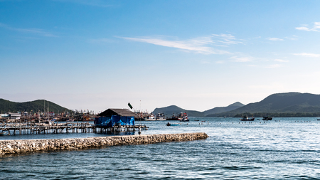 Old wooden fishing boats moored in Chonburi, Thailandの写真素材