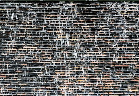 Detail of a decorative cascade waterfall in the gardenの写真素材
