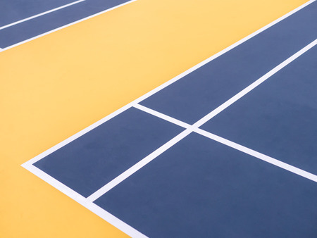 Corner of badminton court, blue and yellow colorの写真素材