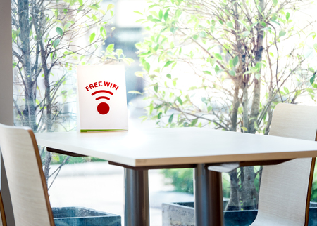 Free wifi sign label for Customer on the table in the fastfood restaurantの写真素材