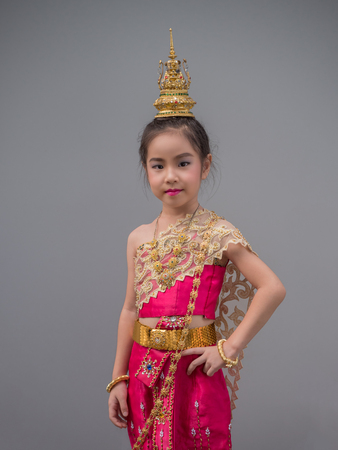 Asian little kid girl dress the Thai traditional dress , National Costumes,の写真素材