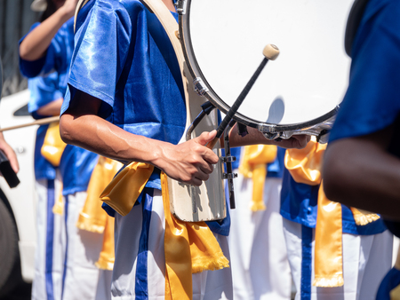 Closeup of group of boy and girl in Thai traditional uniform with drums. , bass drumの写真素材