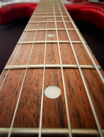 close up shot of fingerboard guitar , rosewood fingerboard with abalone mark, electric guitarの写真素材