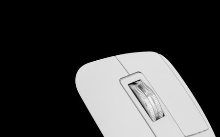 close up shot detail wheel of wireless computer mouse , made from stainless steel, Black backgroundの写真素材