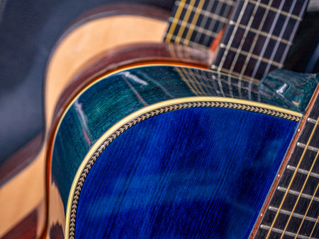 Close Up of Spruce Guitar Top and Binding or Purfling , Blue color on toip and green color back sideの写真素材