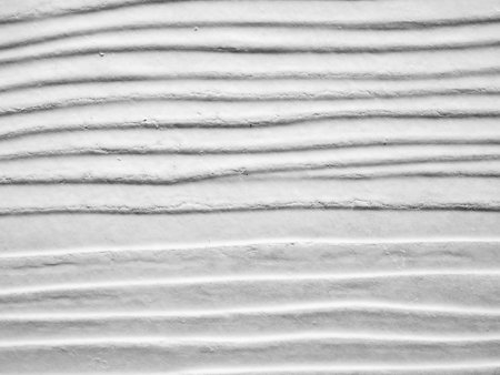 White Concrete texture, Horizontal line like sea wavesの写真素材