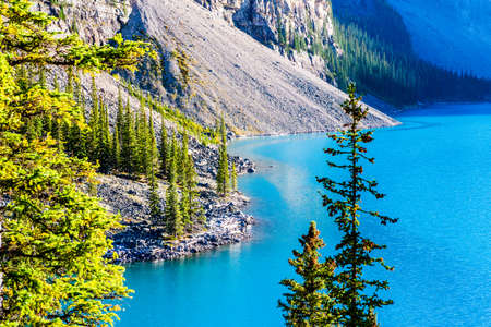 Moraine Lake is a lake in Banff National Park glaciallyfed 14 kilometers outside the Village of Lake Louise Alberta Canada.の写真素材