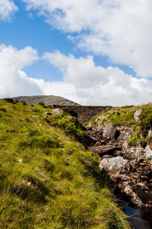 Healy Pass, County Cork, Ireland - August 18, 2010: The Healy Pass was created in 1847 during the famine years in order to help prevent starvation.の写真素材