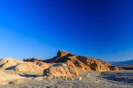 Zabriskie Point is a part of Amargosa Range located in east of Death Valley in Death Valley National Park in the United States noted for its erosional landscape.の写真素材