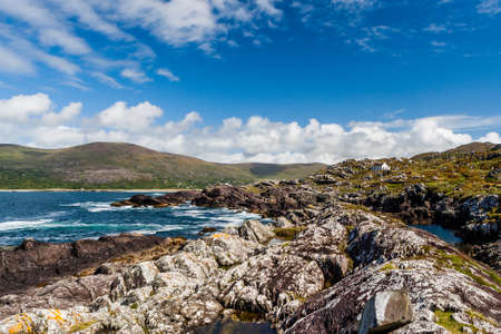 Derrynane, County Kerry, Ireland - August 20, 2010: Lonely white house at Derrynane Bay.のeditorial素材