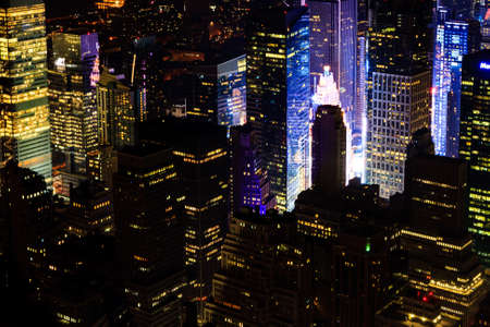 Lower Manhattan at night seen from Empire State Building in New York city, USA