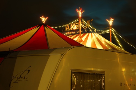 An illuminated big top at night with the nigh sky at backgroundのeditorial素材