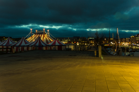 An illuminated big top at night with the nigh sky at backgroundのeditorial素材