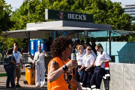 Kiel, Germany. 5th June, 2015. The Band "Boerney und die TriTops" is performing at the christening of the TUI Ship "Mein Schiff 4" and fans are dancingのeditorial素材