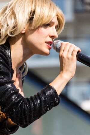 Kiel, Germany. 5th June, 2015. The Band "Boerney und die TriTops" is performing at the christening of the TUI Ship "Mein Schiff 4" and fans are dancingのeditorial素材