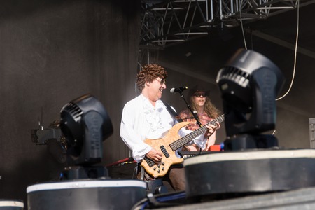Kiel, Germany. 5th June, 2015. The Band "Boerney und die TriTops" is performing at the christening of the TUI Ship "Mein Schiff 4" and fans are dancingのeditorial素材