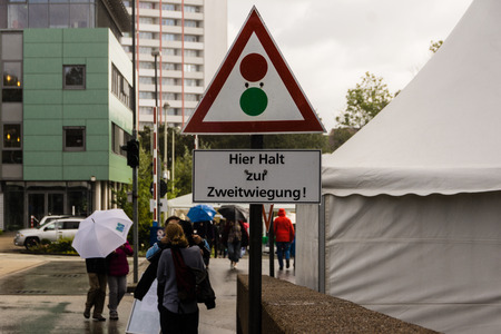 Citizens are visiting in rainy weather the Open Day at the waste incineration plant in Kiel, North Germanyのeditorial素材