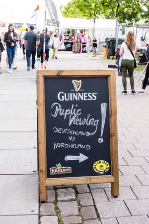 Kiel, Germany- June 21st  2016: Public Viewing of the Football Match North Ireland - Germany during the Kieler Week 2016のeditorial素材