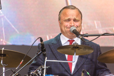 Kiel, Germany - June 18nd 2016: The musician and actor Ulrich Tukur performs with his band "Die Rhythmus Boys" on the Rathaus Stage during the Kieler Woche 2016のeditorial素材