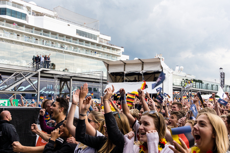 Kiel, Germany - June 26th 2016: Public Viewing of the Football Match Germany - Slovakia / Fans celebrate a Goal during the Kieler Week 2016のeditorial素材