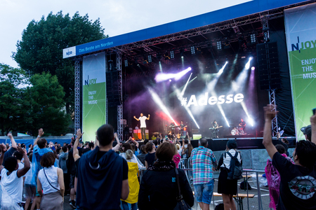 Kiel, Germany - June 24th 2016: The musican Adesse  performs with his band on the HÃ¶rn stage during the Kieler Woche 2016のeditorial素材
