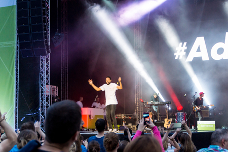 Kiel, Germany - June 24th 2016: The musican Adesse  performs with his band on the HÃ¶rn stage during the Kieler Woche 2016のeditorial素材
