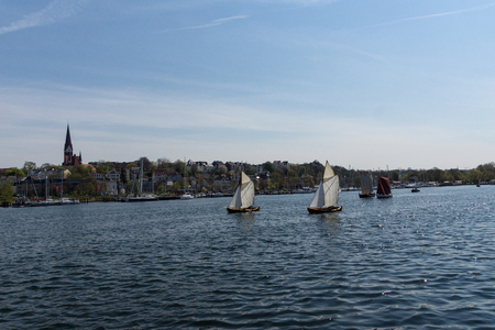 Flensburg, Germany - May 6th 2016:  Impressions of the second Day of the Flensburg Rum Regatte 2016 with  sailing boats, a regatte, craftsman and food stallsのeditorial素材
