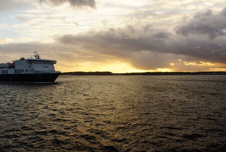 Sunset over the Kiel fjord after a storm の写真素材