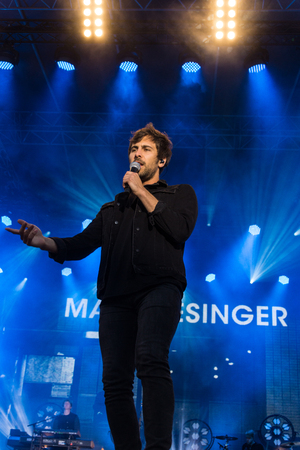 KIEL, GERMANY - June 16 2017: The singersongwriter Max Giesinger is performing on the NDR BÃ¼hne at the Soundcheck Friday during the Kieler Woche 2017のeditorial素材