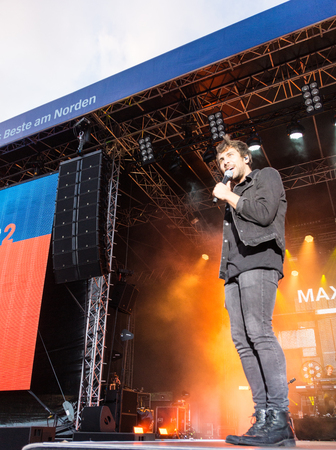 KIEL, GERMANY - June 16 2017: The singersongwriter Max Giesinger is performing on the NDR BÃ¼hne at the Soundcheck Friday during the Kieler Woche 2017のeditorial素材