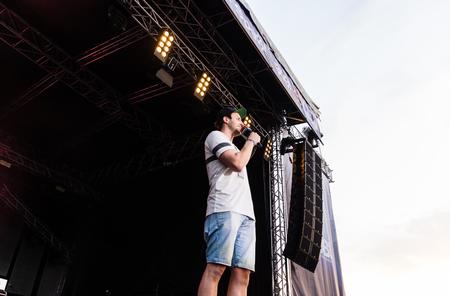 Kiel, Germany - June 19th 2017: The Rapper Samy Deluxe is performing on the HÃ¶rn stage during the Kieler Woche 2017のeditorial素材