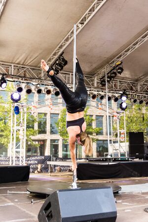Kiel, Germany - June 25th 2019: The Pole-dance Kiel Academy ist dancing to film music from Matrix during 125th Kiel Weekのeditorial素材