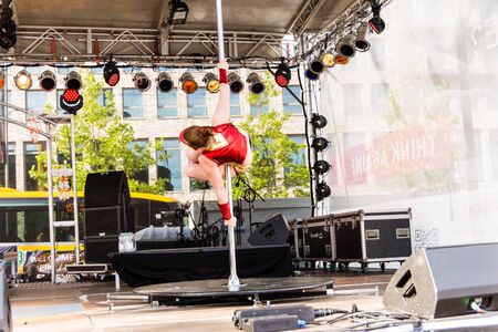 Kiel, Germany - June 25th 2019: The Pole-dance Kiel Academy ist dancing to film music from Ironman...