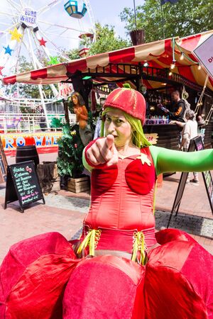 Kiel, Germany - June 27th 2019: The Walking Act Singing Tomato on the 125th Kiel Weekのeditorial素材
