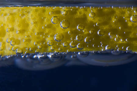 Gin and tonic with slice of lemon close upの写真素材