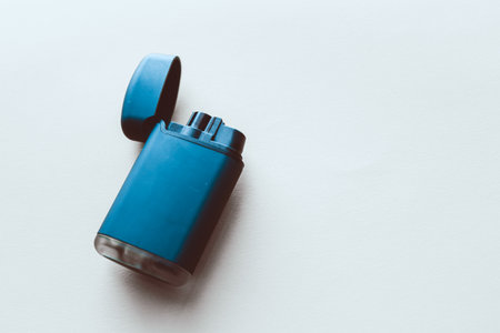 Blue bottle on a white background. Minimal style.の写真素材